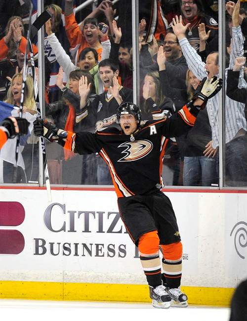 FILE - This April 8, 2011 file photo shows Anaheim Ducks right wing Teemu Selanne, of Finalnd, celebrating his second goal of the game during the third period of their NHL hockey game against the Los Angeles Kings, in Anaheim, Calif. Selanne is returning for another season with the Ducks, agreeing to a one-year contract. Anaheim announced the deal Thursday, Sept. 15, 2011, for Selanne, the franchise's 41-year-old career scoring leader. (AP Photo/Mark J. Terrill, FIle).