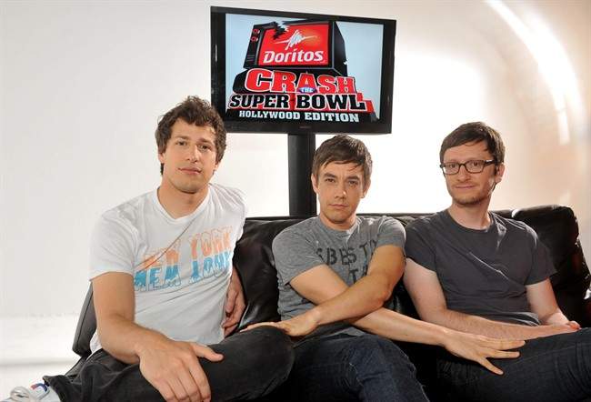 In this photo taken Sept. 25, 2011, Andy Samberg, Akiva Schaffer and Jorma Taccone, of The Lonely Island, on the set of a promotional shoot for Doritos "Crash the Super Bowl," in New York. (AP Photo/PepsiCo Inc., Diane Bondareff).