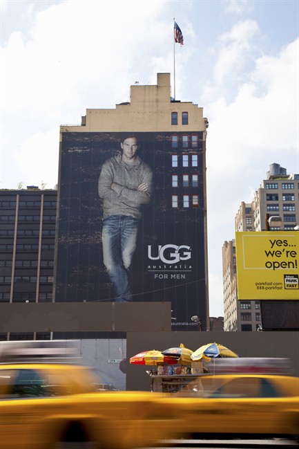 New England Patriots NFL football quarterback Tom Brady appears in an ad for UGG, Monday, Sept. 12, 2011, in New York. Brady is the national spokesman for UGG, a shoemaker best known for women's boots. (AP Photo/Chelsea Matiash).