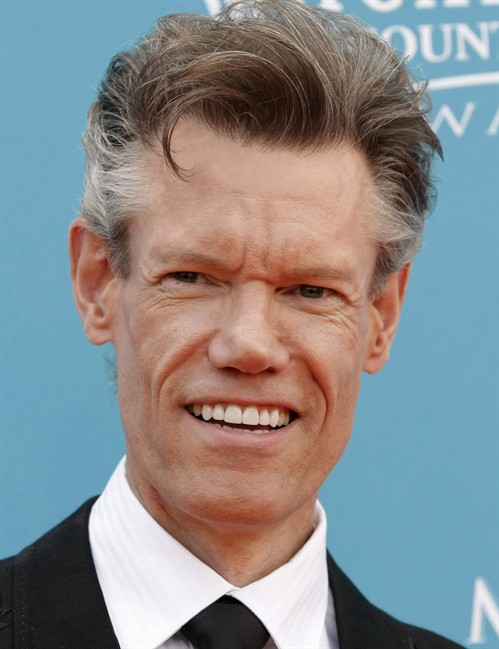Country singer Randy Travis OK after passing out during benefit show in ...