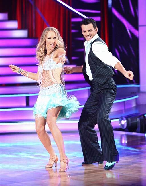 In this image released by ABC, Chynna Phillips, left, and her partner Tony Dovolani perform on the celebrity dance competition series, "Dancing with the Stars," Monday, Sept. 26, 2011 in Los Angeles. (AP Photo/ABC, Adam Taylor).