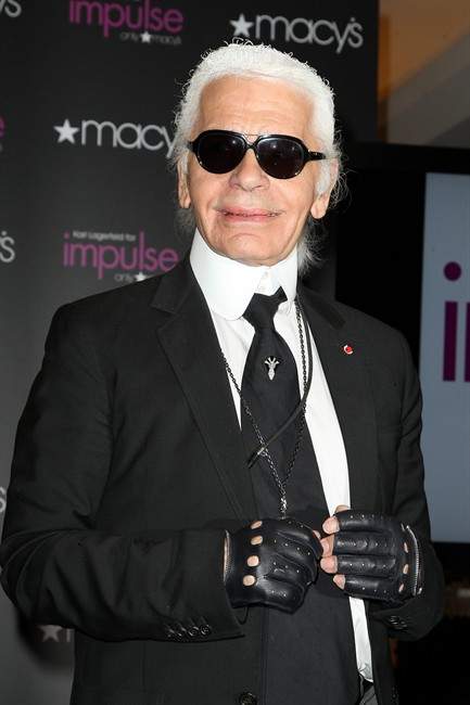 Fashion designer Karl Lagerfeld appears at Macy's Herald Square flagship store where he unveiled his exclusive new collection, Karl Lagerfeld For Impulse Only Tuesday, Sept. 6, 2011 in New York. (AP Photo/Starpix, Amanda Schwab).