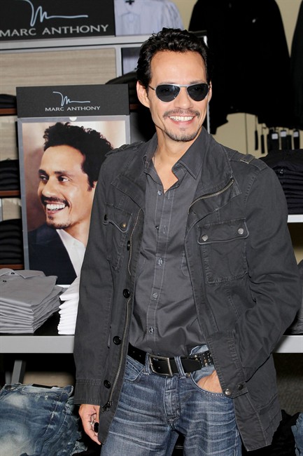 Singer and actor Marc Anthony unveils his signature Marc Anthony Collection at Kohl’s department store Wednesday, Sept. 7, 2011, in Jersey City, N.J. Anthony’s collection is part of a line with Jennifer Lopez, who he is divorcing. Her line is called the Jennifer Lopez Collection. (AP Photo/Starpix, Marion Curtis).