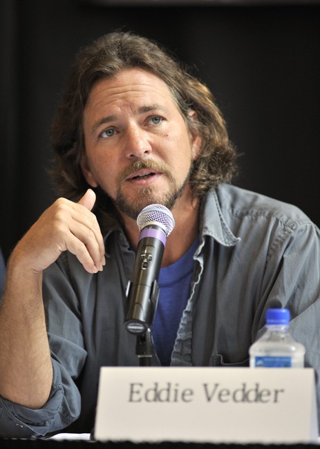 FILE - In this Aug. 28, 2010 file photo, singer Eddie Vedder of the band Pearl Jam participates in a news conference before the Voices for Justice concert in support of the West Memphis Three in Little Rock, Ark. Vedder and the rest of Pearl Jam have supported Damien Echols, Jessie Misskelley and Jason Baldwin, known as the West Memphis Three, who were convicted in 1993 for the murder of three 8-year-old boys in Arkansas. The men were recently released from prison in a legal maneuver that lets them maintain their innocence while acknowledging prosecutors have enough evidence against them. They will be on probation for the next 10 years . (AP Photo/Brian Chilson, file).