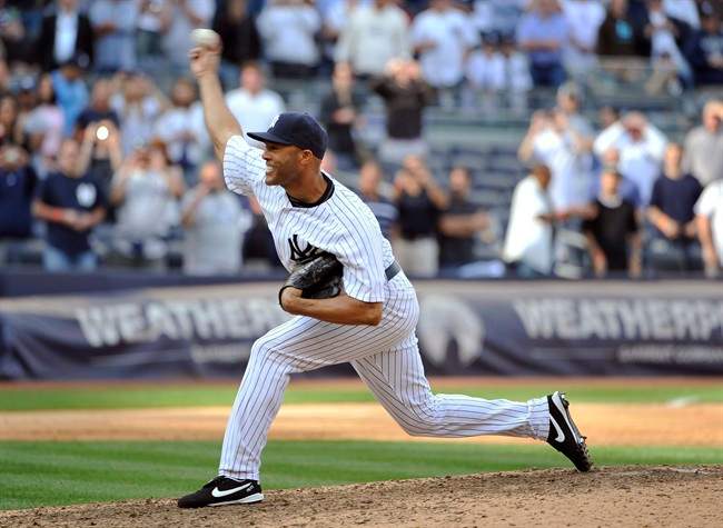 New York Yankees' Mariano Rivera pitches in the ninth inning of a baseball game against the Minnesota Twins on Monday, Sept. 19, 2011, at Yankee Stadium in New York. Rivera picked up the save, the 602nd of his career, which moved him past Trevor Hoffman for the career saves lead. (AP Photo/Kathy Kmonicek).