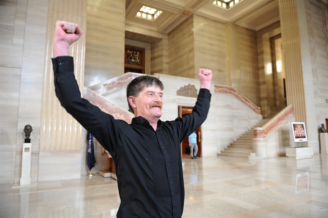 Plaintiff Dean Wilson, who is a former user of Insite, reacts to the ruling regarding Vancouver's supervised injection sites, in the lobby of the Supreme Court of Canada in Ottawa on Friday, September 30, 2011. THE CANADIAN PRESS/Sean Kilpatrick.