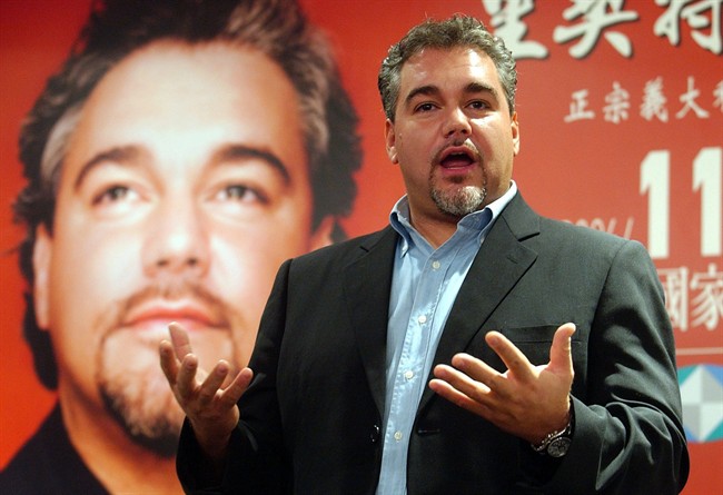 FILE - In this Wednesday, Nov. 8, 2006 file photo, Italian tenor singer Salvatore Licitra performs during a media event in Taipei, Taiwan. Salvatore Licitra has died in the Garibaldi Hospital in Catania, Sicily, Monday morning, Sept. 5, 2011, without ever regaining consciousness after a motorscooter accident last month. (AP Photo/Chiang Ying-ying, File).