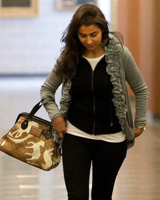 Amanda Rodrigues, widow of the late former boxing champion Arturo Gatti, takes a break from proceedings at the Montreal courthouse where a civil case has begun to determine the beneficiary of Gatti's estate Wednesday, September 14, 2011 in Montreal.THE CANADIAN PRESS/Ryan Remiorz.