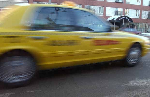 Woman leaps from Edmonton taxi after fare-fraud call - image