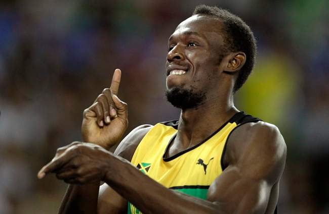 Jamaica's Usain Bolt gestures before in a Men's 200m semifinal at the World Athletics Championships in Daegu, South Korea, Friday, Sept. 2, 2011. (AP Photo/Matt Dunham).