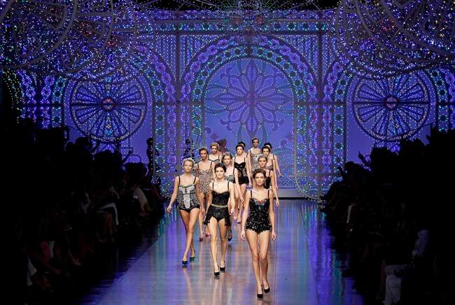 Models wear creations part of the Dolce & Gabbana women's Spring-Summer 2012 fashion collection that was presented in Milan, Italy, Sunday, Sept. 25, 2011. (AP Photo/Antonio Calanni).