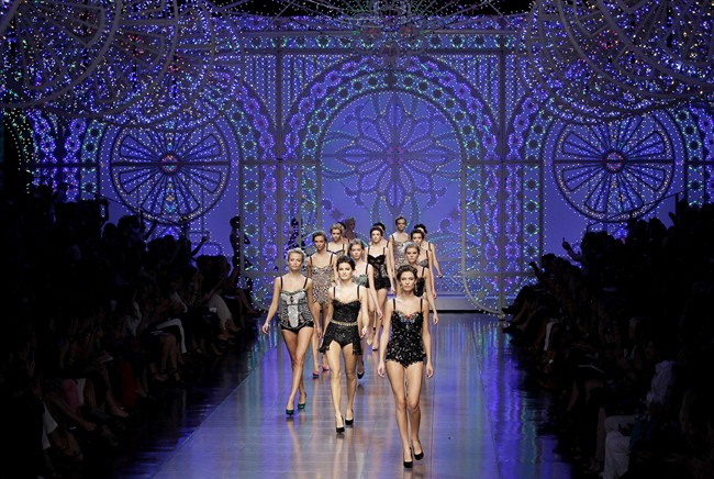Models wear creations part of the Dolce & Gabbana women's Spring-Summer 2012 fashion collection that was presented in Milan, Italy, Sunday, Sept. 25, 2011. (AP Photo/Antonio Calanni).