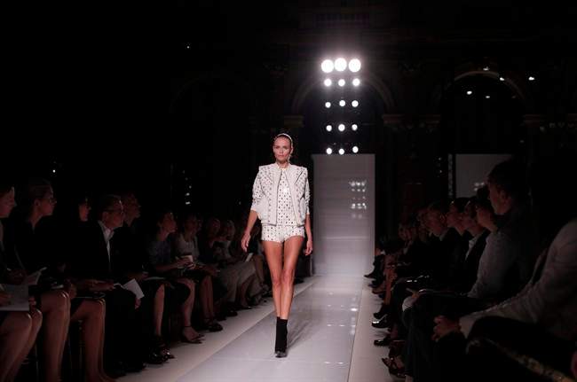 CORRECTS DATE A model wears a creation designed by French fashion designer Olivier Rousteing for Balmain's spring-summer 2012 ready to wear collection presented Thursday Sept. 29, 2011 in Paris. (AP Photo/Thibault Camus).