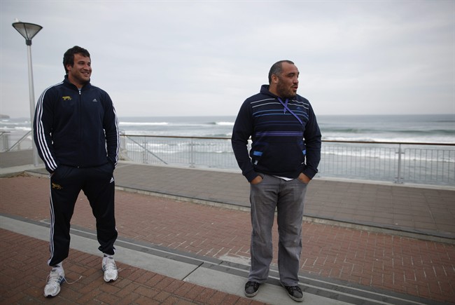Argentina rugby players Alejandro Campos, left, and Rodrigo Roncero walk along the boardwalk at St Clair Beach in Dunedin, New Zealand, Wednesday, Sept. 7, 2011. Argentina will play their opening Rugby World Cup game against England on Sep.10.(AP Photo/Natacha Pisarenko).