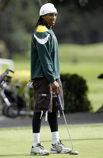 South African rugby player Odwa Ndungane looks on during their golf game at the Royal Wellington Golf Club in Wellington, New Zealand, Thursday Sept. 15, 2011. South Africa will play their next Rugby World Cup against Fiji on Sept 17. (AP Photo/Themba Hadebe).