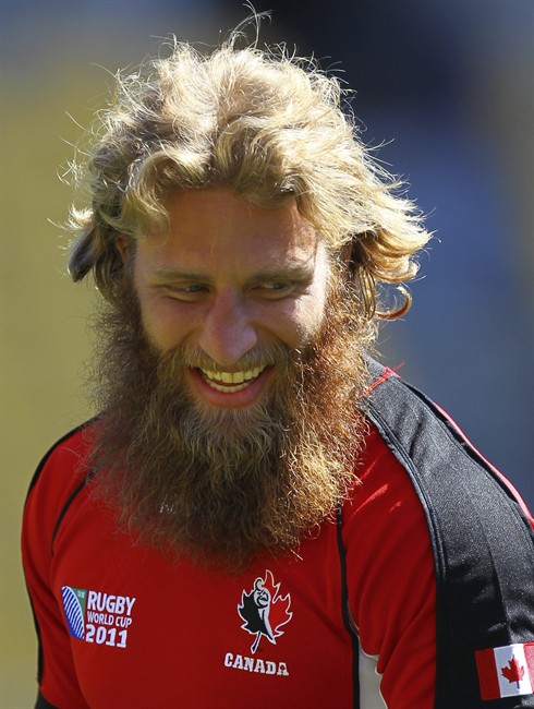 Canadian flanker Adam Kleeberger, whose bushy beard attracted worldwide attention at the Rugby World Cup, is going to shave for charity. Kleeberger will have his beard removed Oct. 17 in Victoria by CBC comedian Rick Mercer as part of an upcoming episode of "The Rick Mercer Report." Kleeberger smiles during the captain's run, Friday, Sept. 30, 2011 in Wellington, New Zealand. THE CANADAIN PRESS/AP-Junji Kurokawa.