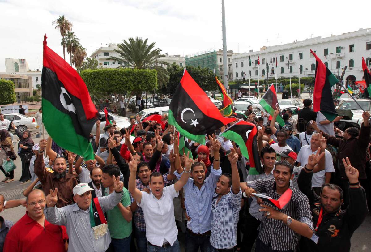 A dictator’s end: Gadhafi pulled from drain pipe, killed; half-naked body paraded in streets - image