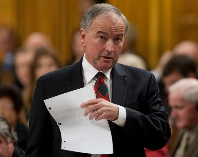 Minister of Justice and Attorney General of Canada Rob Nicholson rises during Question Period in the House of Commons on Parliament Hill in Ottawa, Thursday October 6, 2011. THE CANADIAN PRESS/Adrian Wyld.