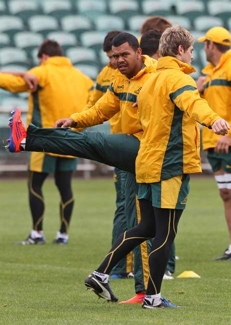 Australia's rugby players Kurtley Beale, left, and James O'Connor warm up during training in Auckland, New Zealand, Wednesday, Oct. 19, 2011. Australia will play Wales in the Rugby World Cup bronze final on Friday Oct. 21. (AP Photo/Rob Griffith).