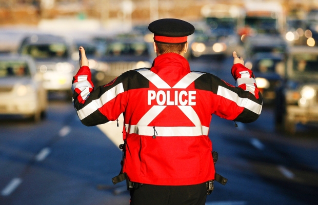 FILE: A Calgary police officer conducts a Checkstop. 
