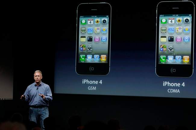 Apple's Phil Schiller talks about the iPhone 4S world phone during an announcement at Apple headquarters in Cupertino, Calif., Tuesday, Oct. 4, 2011. (AP Photo/Paul Sakuma).