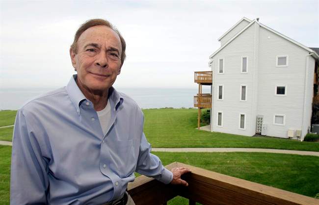 In this Monday, Oct. 10, 2011 photo, Joe Latina, 71, is shown on his porch at his home in Ashtabula, Ohio. Latina participated in a study involving vitamin E pills. Vitamin E pills are linked with an increased risk for prostate cancer, according to follow-up data from a study aiming to see if the supplements could prevent the disease but halted when there were signs of possible harm. Men who had been randomly assigned to take vitamin E were 17 percent more likely to get prostate cancer than those given dummy pills, the follow-up report found. (AP Photo/Tony Dejak).