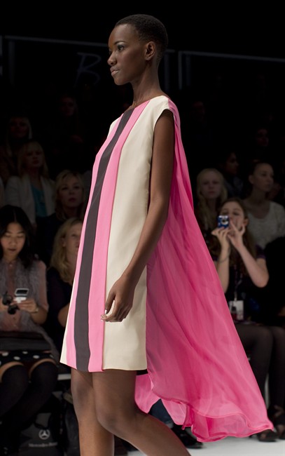 A model shows a creation by the designers Martin Lim as the judges for the for Mercedes-Benz Start Up competition watch at Toronto Fashion Week on Tuesday October 18, 2011. THE CANADIAN PRESS/Chris Young.