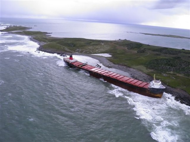 MV Miner ran aground off Scatarie Island, a provincially designated wilderness management area, on Sept. 20., 2011. The premier of Nova Scotia is rejecting the federal government's claim that a bulk carrier that ran aground off the coast of Cape Breton is not an environmental hazard. THE CANADIAN PRESS/ho-Nova Scotia government.