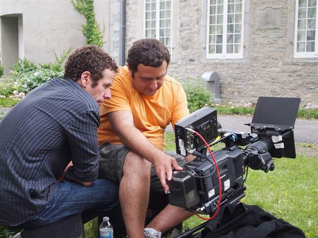TV producer Kenneth Hirsch (left) and Alain Julfayan are shown on the set of the new television show "Extraordinary Canadians" in a handout photo. From the very beginning, Hirsch decided it would take extraordinary measures to adequately profile the lives of 18 extraordinary Canadians. THE CANADIAN PRESS/HO.
