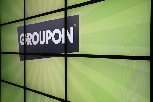 File photo: The Groupon logo inside the online coupon company's offices Thursday, Sept. 22, 2011, in Chicago.