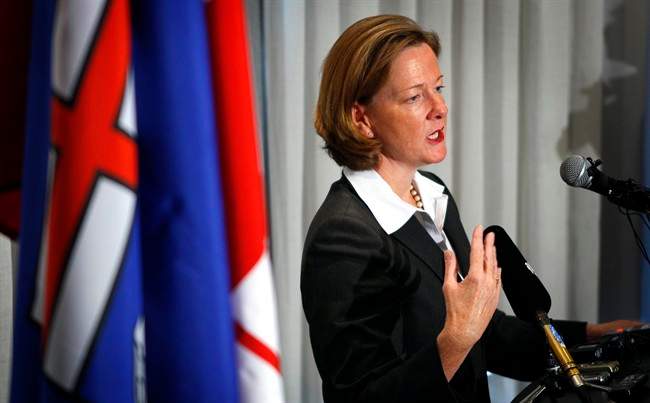 Newly-elected Alberta PC leader and Alberta Premier Alison Redford holds a news conference in Edmonton, Alta., Sunday, Oct. 2, 2011. THE CANADIAN PRESS/Jeff McIntosh.