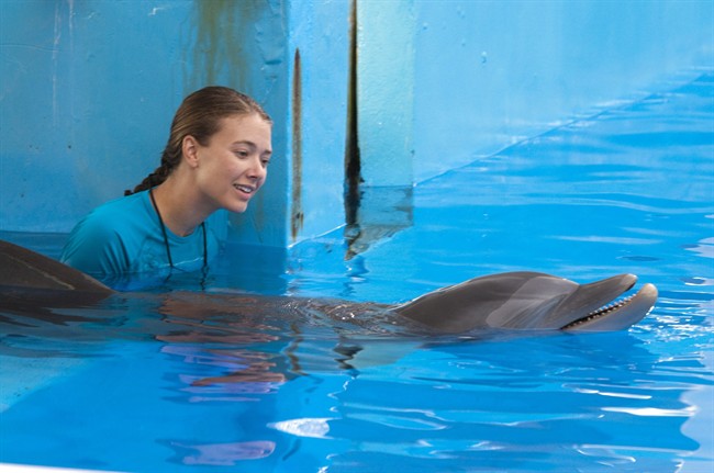 Austin Highsmith is seen here in the role of Phoebe in Alcon Entertainment’s family adventure, “Dolphin Tale", in the Warner Bros. Pictures release. “Dolphin Tale" dethroned "The Lion King" in the weekend box office. The "Dolphin Tale" held up well with $14.2 million in it's second weekend to take the #1 spot from the "Lion King", the Disney reissue that had been at the top of the past two weekends. (AP Photo/Jon Farmer, Alcon Entertainment).