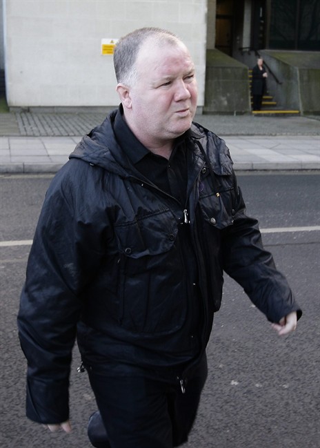 In this Friday Feb. 12, 2010 file photo, Wayne Rooney, father of Manchester United and England striker Wayne Rooney, is seen arriving at Manchester Mercantile Court, Manchester, England. The elder Rooney has been arrested as part of an investigation into betting irregularities at a Scottish Premier League match. Police say Thursday, Oct. 6, 2012 that eight other men, including Motherwell midfielder Steve Jennings, were also arrested in the probe. (AP Photo/Jon Super, file).