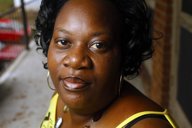 Vickie Webb poses for a photograph at her apartment in Durham, N.C., Wednesday, Oct. 19, 2011. Webb, 43, lived in the projects in Durham, N.C. for several years before a housing agency helped relocate her and her husband to a better neighborhood. According to a study released Wednesday, Oct. 19, 2011, poor women in big city public housing a chance to live in more affluent neighborhoods. had lower rates of diabetes and extreme obesity. Webb was not part of the study. (AP Photo/Jim R. Bounds).