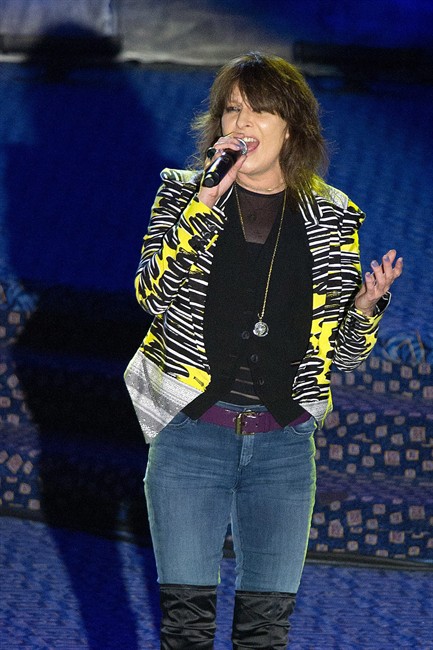 In this June 16, 2011 photo, Chrissie Hynde performs onstage at the 42nd Annual Songwriters Hall of Fame Awards in New York. Hynde has closed her vegetarian restaurant in her hometown of Akron, Ohio. The Akron Beacon Journal reports Hynde posted the shutdown notice Sunday, Oct. 2, 2011, on the VegiTerranean restaurant Web site and blamed the struggling economy. (AP Photo/Charles Sykes).