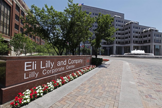 FILE - In this June 30, 2011 photo, the Eli Lilly and Co corporate headquarters is pictured in Indianapolis. Eli Lilly and Co.'s third-quarter net income fell 5 percent on rising expenses fueled by foreign exchange rates, the health care overhaul and the drugmaker's preparations for a critical patent expiration on Thursday, Oct. 20, 2011. (AP Photo/Darron Cummings).