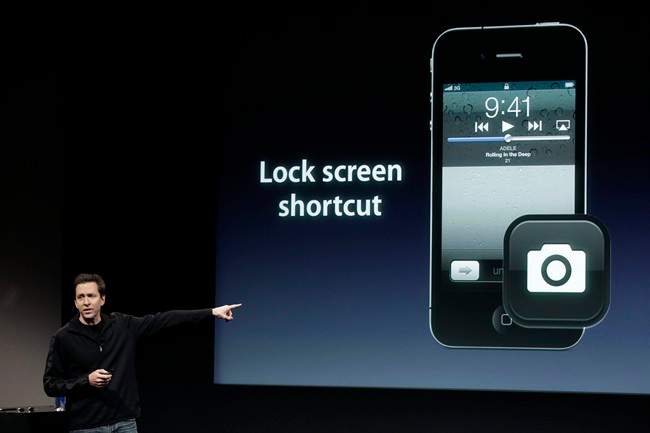 FILE - In this Oct. 4, 2011 file photo, Apple's Scott Forstall, talks about camera on the Apple iPhone 4S during an announcement at Apple headquarters in Cupertino, Calif. Apple Inc., announced Mondy, Oct. 10, 2011, pre-orders of its iPhone 4S have topped one million in a single day, surpassing the previous single day pre-order record of 600,000 held by iPhone 4.(AP Photo/Paul Sakuma, File).
