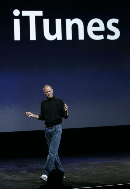 FILE - In this Sept. 9, 2008 file photo, Apple CEO Steve Jobs talks about iTunes 8 at an event in San Francisco. Jobs' entree into the music world was more than a success _ it was a phenomenon. Today, iTunes owns the majority of the digital sales market, has redefined listening experience, and has for all purposes become the way that music is consumed. (AP Photo/Paul Sakuma, file).