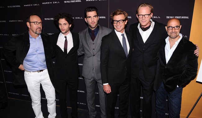 From left, actors Kevin Spacey, Penn Badgley, Zachary Quinto, Simon Baker, Paul Bettany and Stanley Tucci attend the premiere of "Margin Call" on Monday, Oct. 17, 2011, in New York. (AP Photo/Peter Kramer).