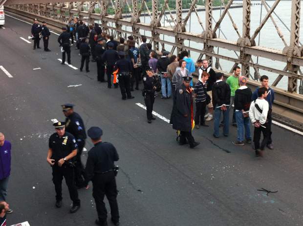 700 arrested after protests on New York’s Brooklyn Bridge - image