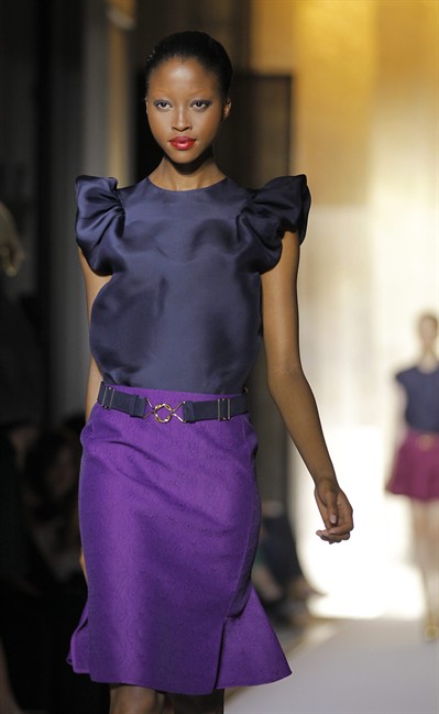 A model displays a creation by Italian designer Stefano Pilati for Yves saint Laurent spring-summer 2012 ready to wear collection presented , Monday, Oct.3, 2011, in Paris. (AP Photo/Jacques Brinon).