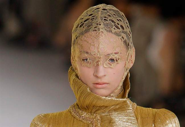 A model displays a creation by British fashion designer Sarah Burton for Alexander McQueen spring-summer 2012 ready to wear collection presented , Tuesday, Oct. 4, 2011, in Paris. (AP Photo/Jacques Brinon).