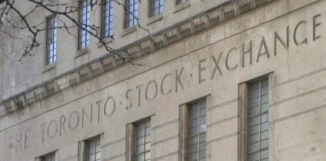 The Toronto Stock Exchange (TSX)'s name is shown on the facade of its former home on Bay Street in Toronto. THE CANADIAN PRESS/Chris Young.