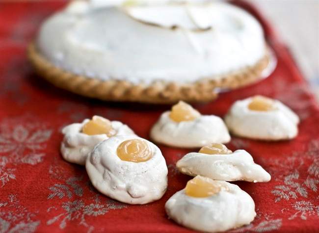 This Oct. 3, 2011 photo shows lemon meringue pie cookies in Concord, N.H. Lemon meringue pie is an easy dessert to rethink as a cookie. Though the crust was left off, these cookies have all the same elements as that delicious pie. (AP Photo/Matthew Mead).