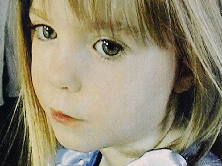 This file picture taken on May 13, 2007 shows a poster displaying the police and a newsdesk number for missing British girl Madeleine McCann hung on a street in the southern Portuguese beach resort of Lagos.
