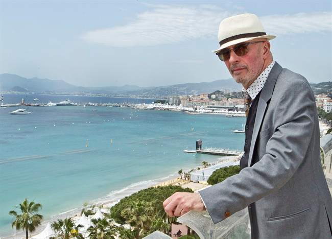 Director Jacques Audiard poses for portraits at the American Pavilion during the 65th international film festival, in Cannes, southern France, Saturday, May 19, 2012. (AP Photo/Joel Ryan).