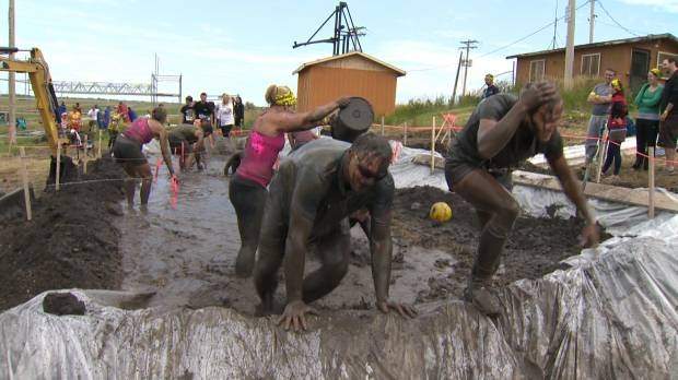 Hundreds of Manitobans get filthy for charity - image