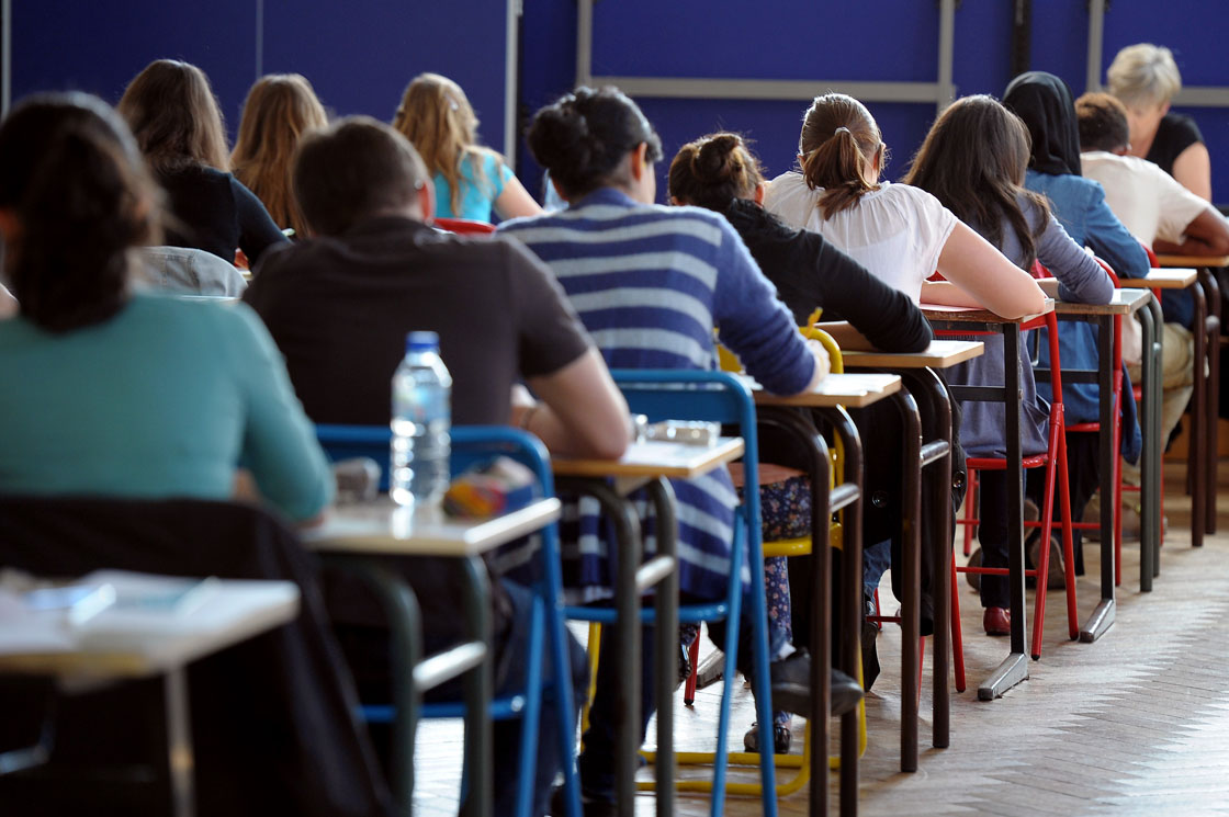 French students work on the test of Philosophy as they take the baccalaureat exam (high school graduation exam) on June 18, 2012 at the Pasteur high school in Strasbourg, eastern France.
