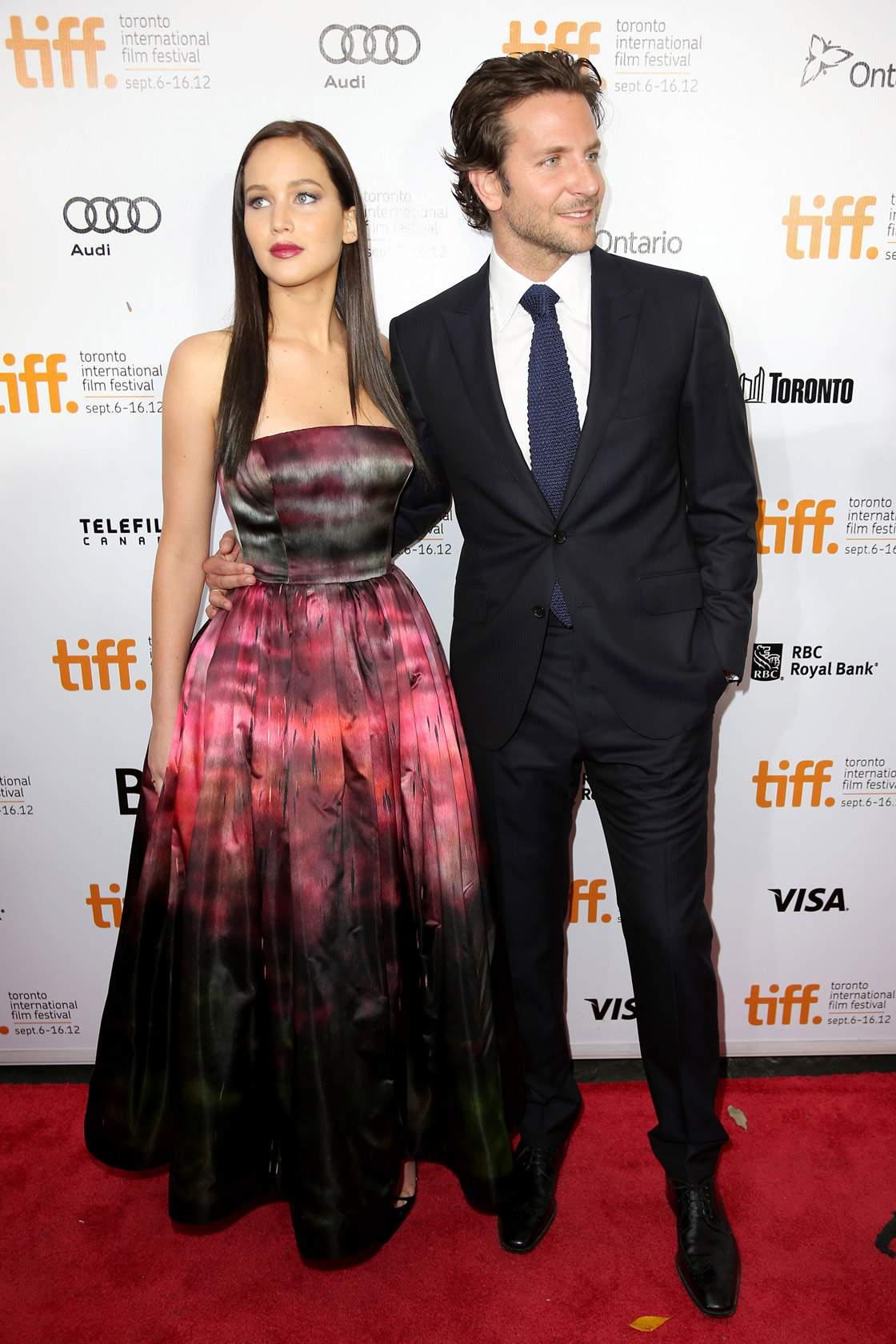 Actress Jennifer Lawrence (L) and Actor/ Executive Producer Bradley Cooper attend the 'Silver Linings Playbook' premiere during the 2012 Toronto International Film Festiva at Roy Thomson Halll on September 8, 2012 in Toronto.