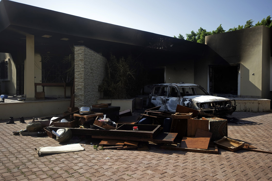 A picture shows a burnt vehicle and broken furniture inside the US consulate compound in Benghazi on September 13, 2012, following an attack on the building late on September 11 in which the US ambassador to Libya, Chris Stevens, and three other US nationals were killed.